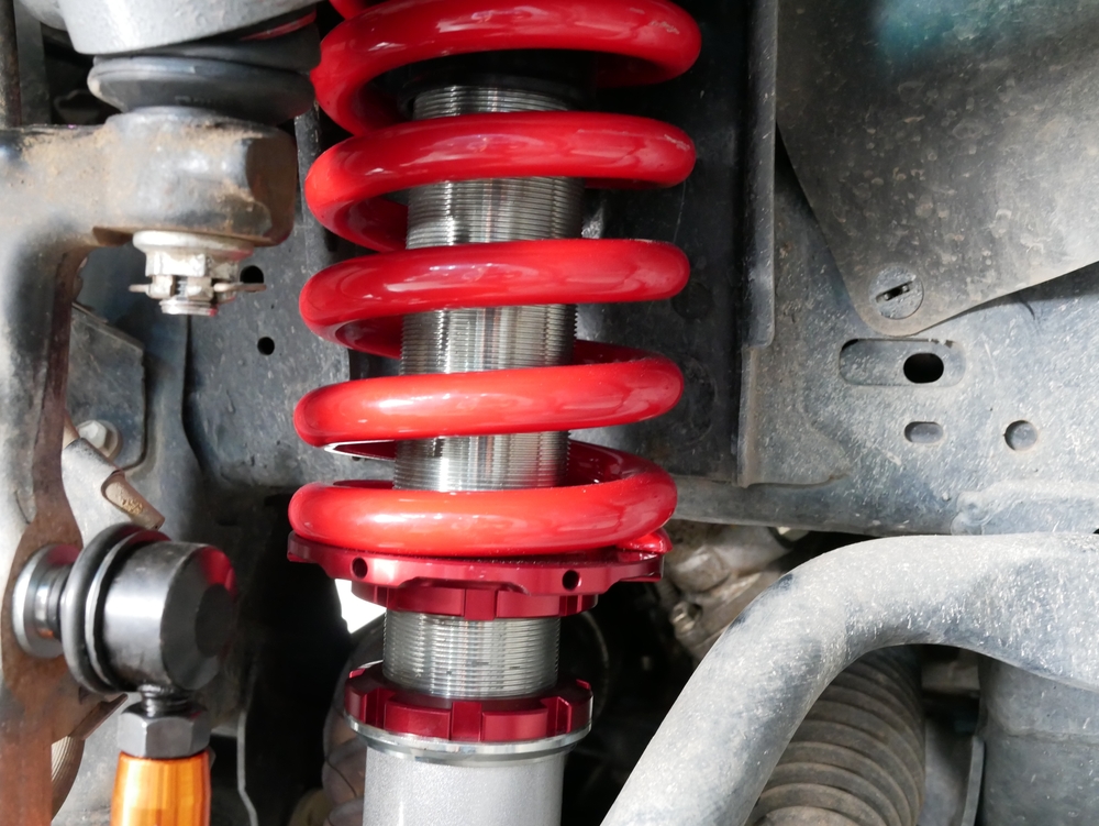 Red,Shock,Absorbers,Of,Car,At,Garage.